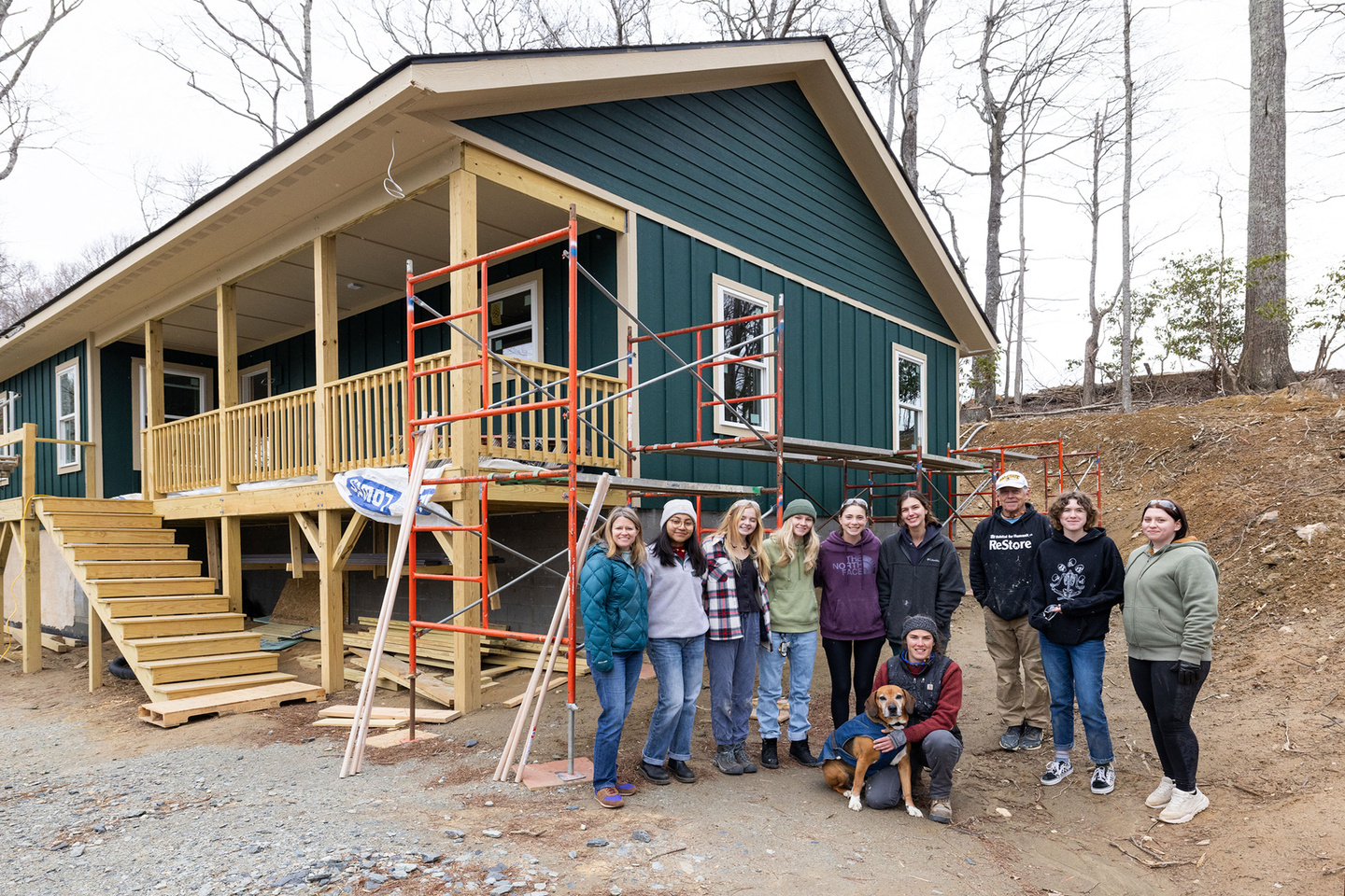 App Builds a Home volunteers in front of the Gay Family home. 